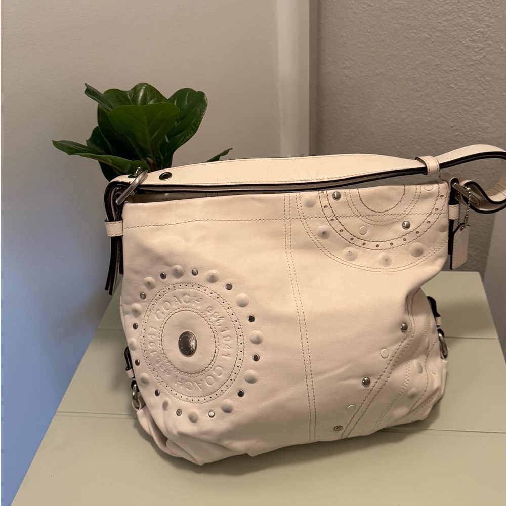 Cream genuine leather Coach purse with beautiful lime green interior. Never used